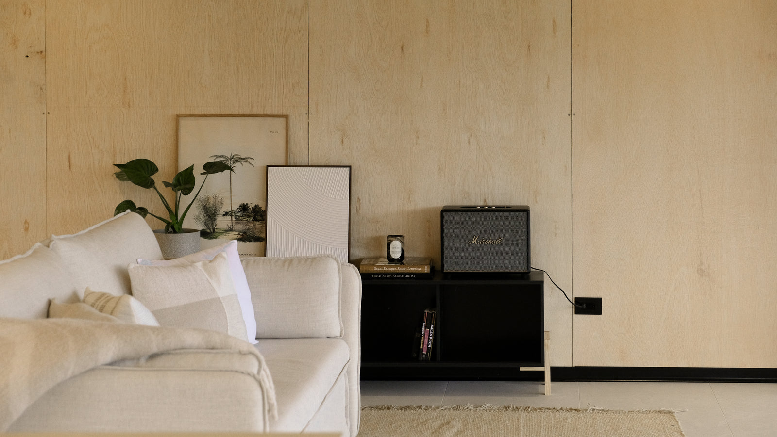 The plan is open throughout, so the furniture does the dividing.