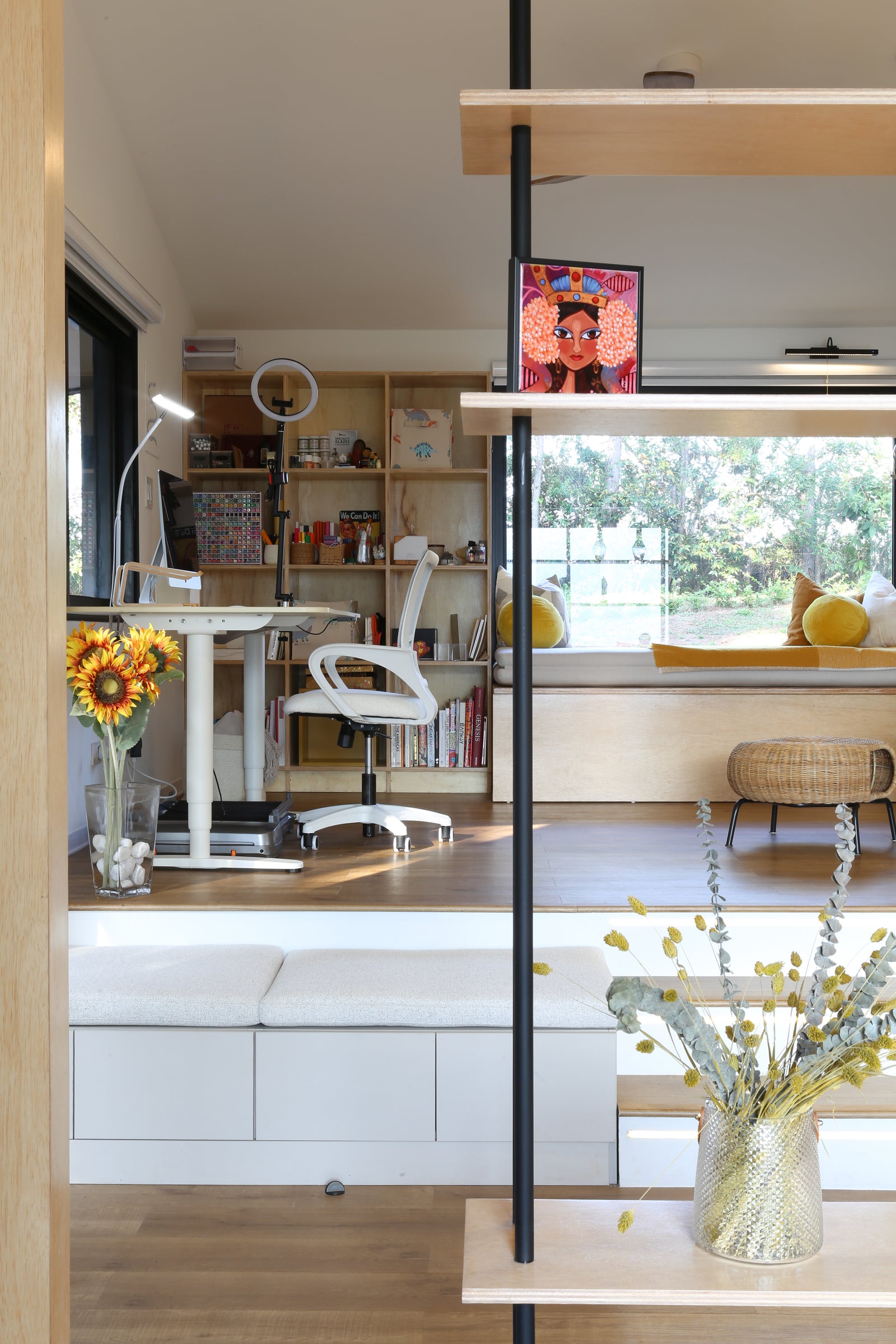 The plan is open throughout, so the furniture does the dividing.